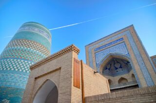 Fifty Shades of Blue
A towering mosaic of turquoise and sky, where ancient walls rise into an endless spectrum of blue.
#TravelPhotography #ArchitectureLovers #Khiva